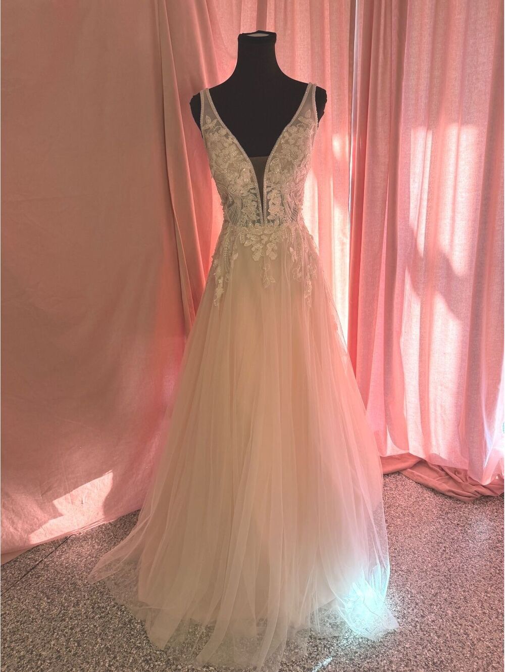 Elegant Blush Lace and Tulle Wedding Dress with Deep V-Neck